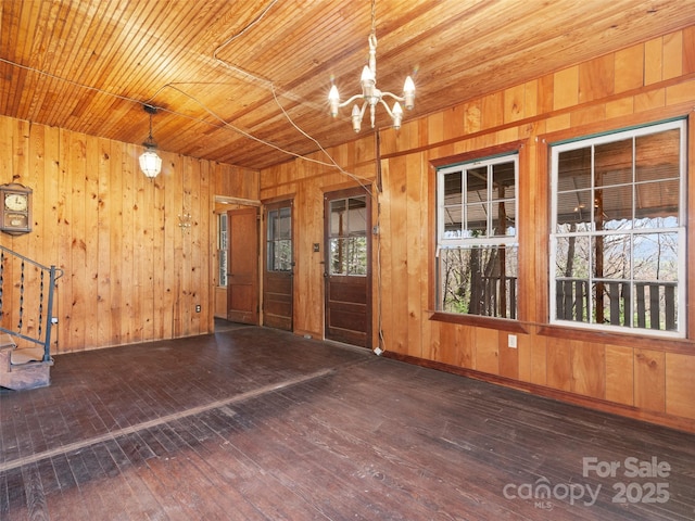 40 Wells Rd, Waynesville, NC 28785 - entrance foyer featuring wood ceiling, a chandelier, hardwood / wood-style floors, stairway, and wooden walls