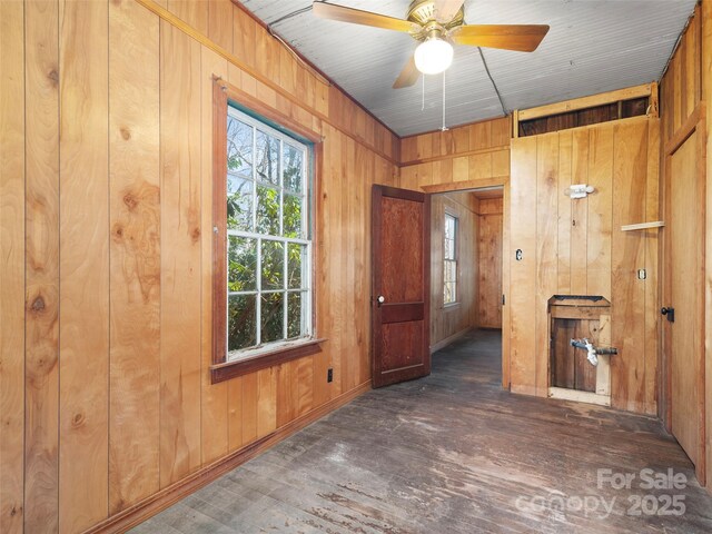 40 Wells Rd, Waynesville, NC 28785 - spare room featuring wood walls, a wealth of natural light, and wood finished floors