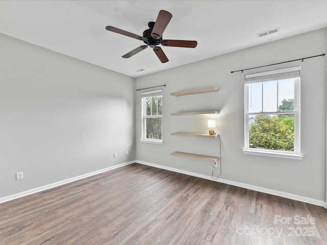 240 Faust Rd, Davidson, NC 28036 - empty room with wood finished floors, baseboards, and a ceiling fan