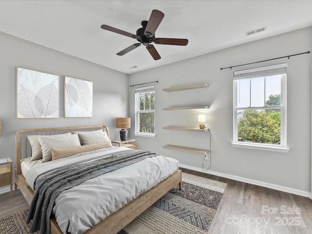 240 Faust Rd, Davidson, NC 28036 - bedroom featuring wood finished floors, baseboards, and a ceiling fan
