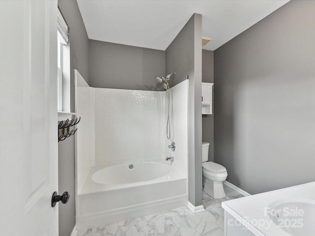 240 Faust Rd, Davidson, NC 28036 - full bath featuring marble look tile flooring, toilet, tub / shower combination, and baseboards