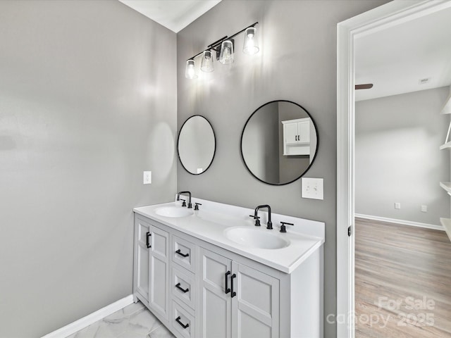 240 Faust Rd, Davidson, NC 28036 - bathroom with baseboards and double vanity