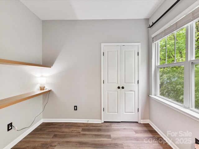 240 Faust Rd, Davidson, NC 28036 - unfurnished room with wood finished floors and baseboards
