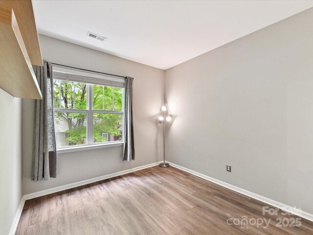 240 Faust Rd, Davidson, NC 28036 - empty room with wood finished floors and baseboards