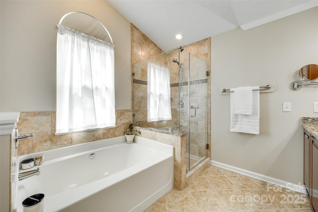 full bath with a stall shower, baseboards, a bath, tile patterned floors, and vanity