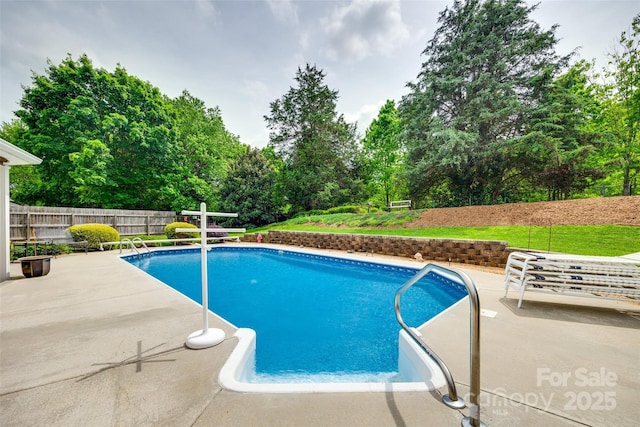 view of pool with a patio, fence, and a fenced in pool