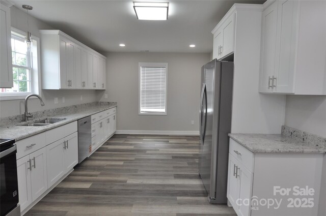 602 Still St Unit 1Blk C, Chester, SC 29706 - kitchen featuring white cabinetry, a sink, stainless steel appliances, recessed lighting, and wood finished floors