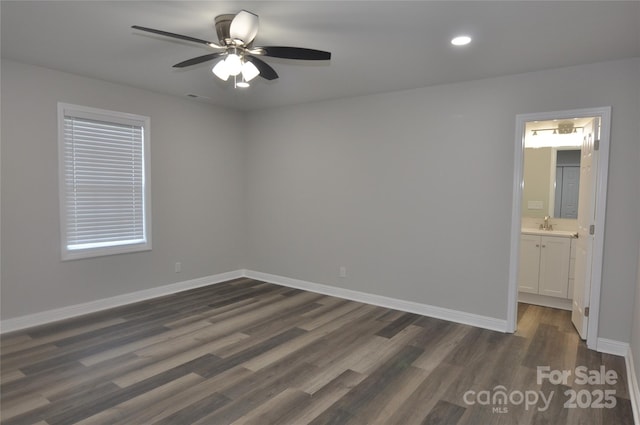 602 Still St Unit 1Blk C, Chester, SC 29706 - spare room with recessed lighting, ceiling fan, a sink, baseboards, and dark wood-type flooring