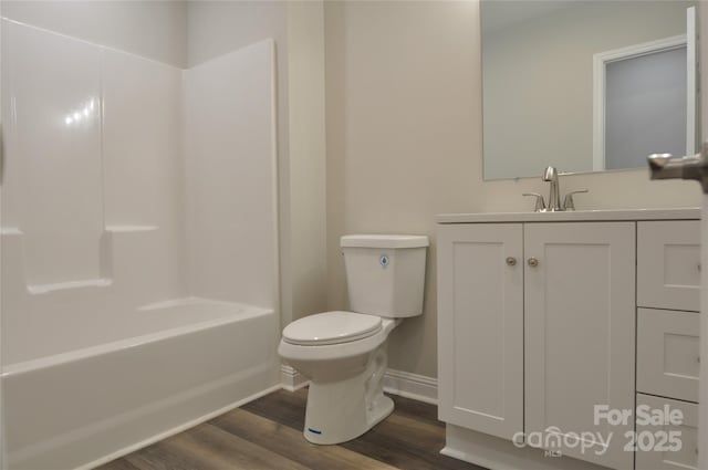 602 Still St Unit 1Blk C, Chester, SC 29706 - full bathroom featuring wood finished floors, bathing tub / shower combination, toilet, vanity, and baseboards