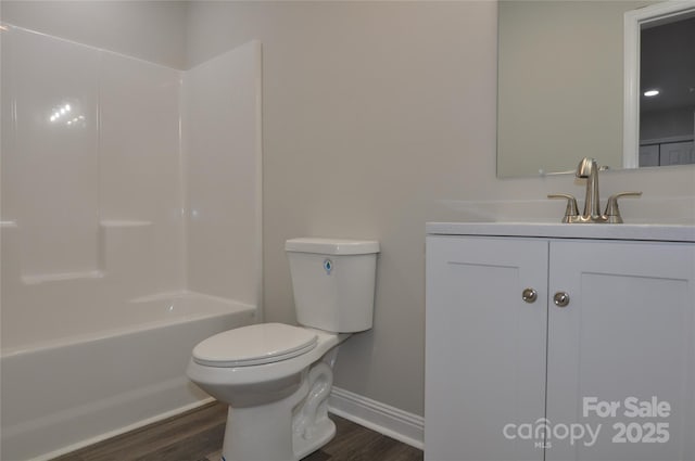 602 Still St Unit 1Blk C, Chester, SC 29706 - full bathroom with baseboards, wood finished floors, toilet, and vanity