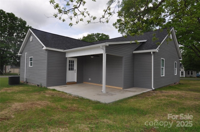 602 Still St Unit 1Blk C, Chester, SC 29706 - rear view of house with roof with shingles, a yard, central AC unit, and a patio