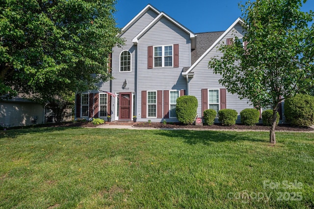 7905 Sedgebrook Dr E, Stanley, NC 28164 - view of front facade featuring a front yard and a shingled roof