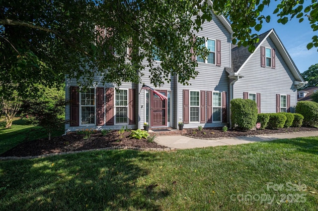 7905 Sedgebrook Dr E, Stanley, NC 28164 - view of front of house with a front lawn