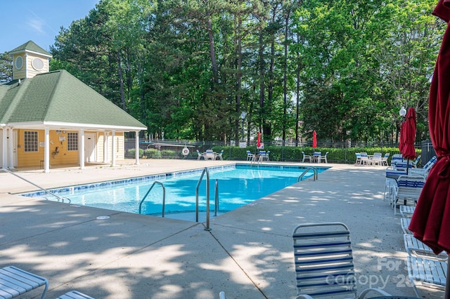 7905 Sedgebrook Dr E, Stanley, NC 28164 - community pool featuring a patio