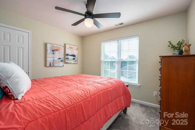 7905 Sedgebrook Dr E, Stanley, NC 28164 - carpeted bedroom with baseboards and a ceiling fan