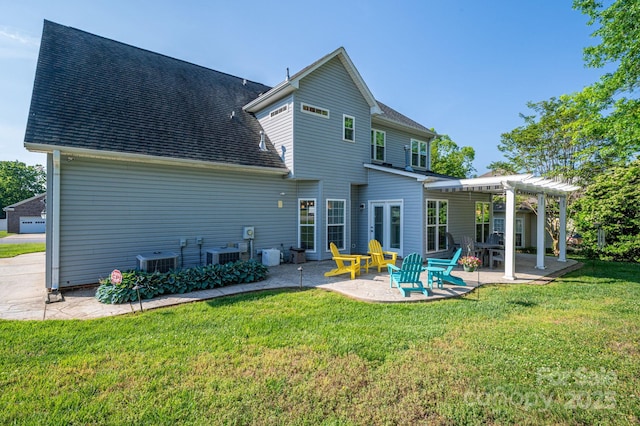 7905 Sedgebrook Dr E, Stanley, NC 28164 - rear view of property featuring a pergola, a patio, a yard, roof with shingles, and central AC