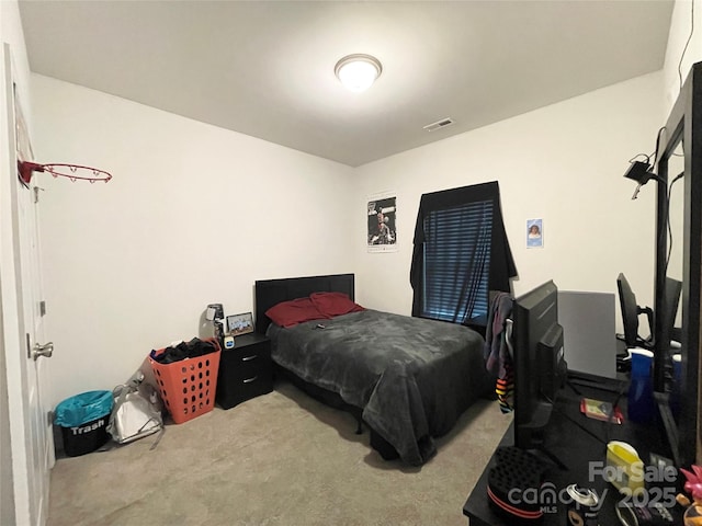 bedroom featuring carpet flooring and visible vents