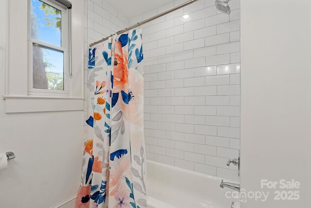 bathroom with shower / tub combo