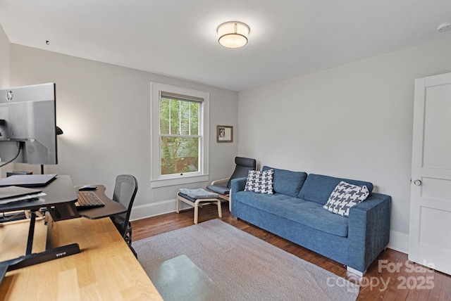 office with wood finished floors and baseboards
