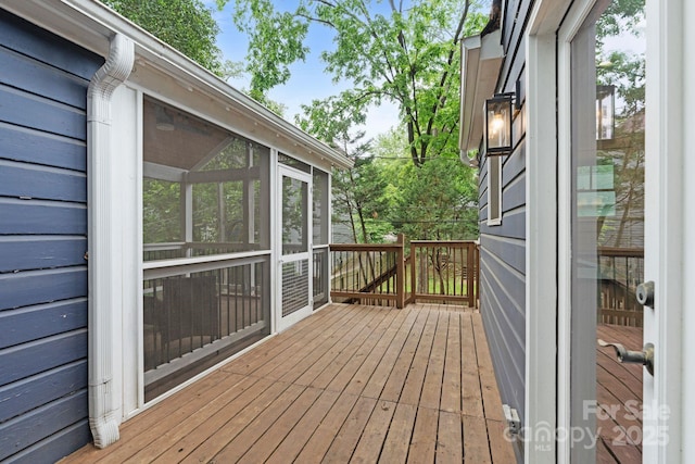 deck featuring a sunroom