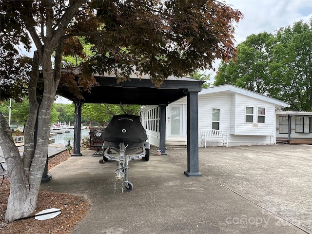 exterior space with a carport
