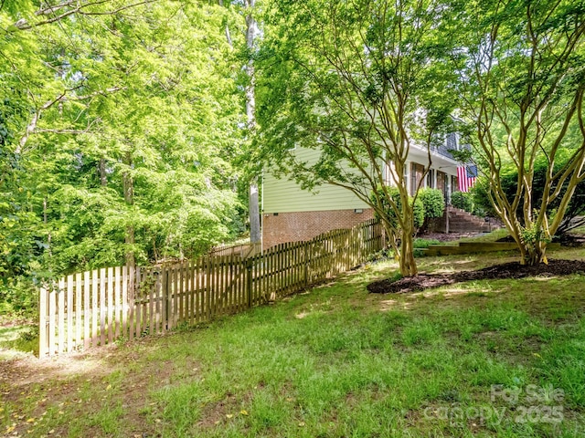 view of yard featuring fence