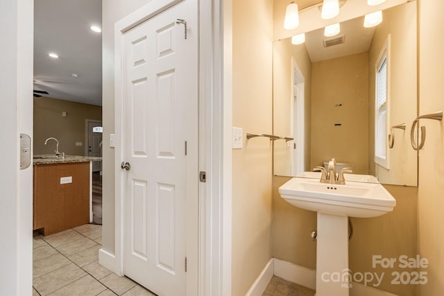bathroom with visible vents, recessed lighting, baseboards, and tile patterned floors