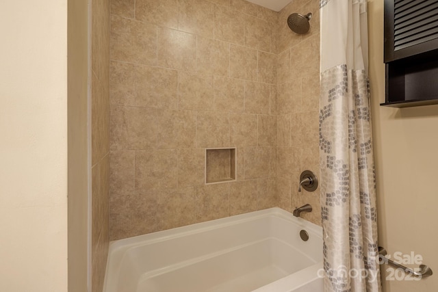 bathroom featuring shower / tub combo with curtain