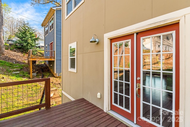 wooden terrace featuring french doors