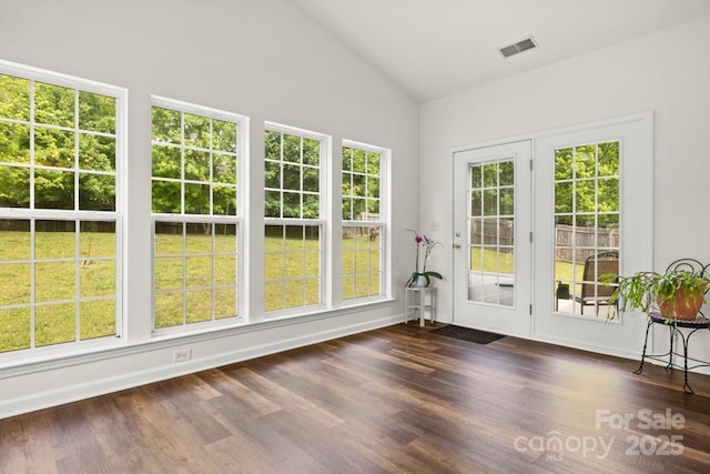 unfurnished sunroom featuring visible vents and french doors