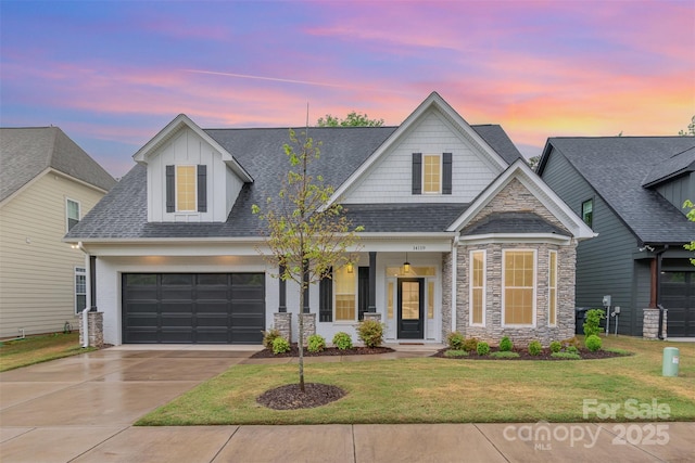 14119 Shelburne Village Dr, Charlotte, NC 28278 - view of front of property featuring a shingled roof, a garage, driveway, stone siding, and a front lawn