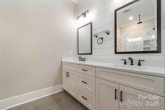 14119 Shelburne Village Dr, Charlotte, NC 28278 - bathroom featuring a sink, a tile shower, double vanity, and visible vents