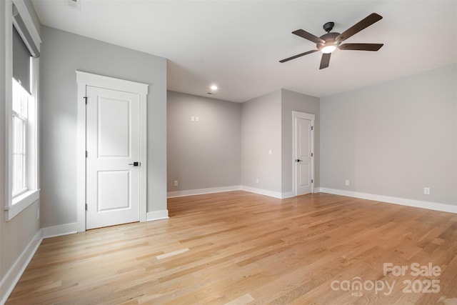 14119 Shelburne Village Dr, Charlotte, NC 28278 - spare room featuring baseboards, recessed lighting, ceiling fan, and light wood-style floors