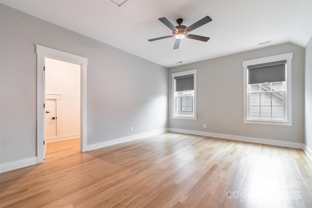 14119 Shelburne Village Dr, Charlotte, NC 28278 - spare room featuring baseboards, visible vents, a ceiling fan, and light wood finished floors