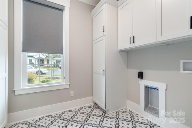 14119 Shelburne Village Dr, Charlotte, NC 28278 - laundry area with hookup for a washing machine, cabinet space, and baseboards
