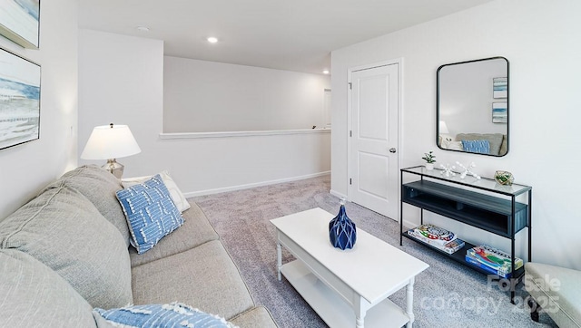 carpeted living room with baseboards and recessed lighting