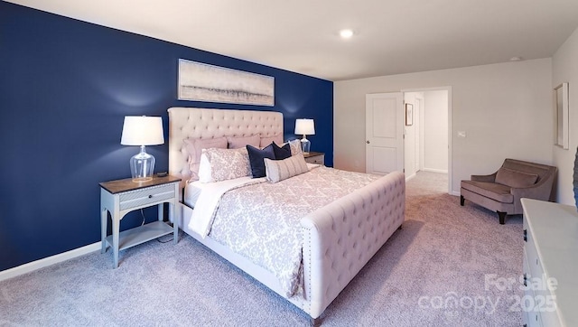 bedroom featuring carpet floors and baseboards