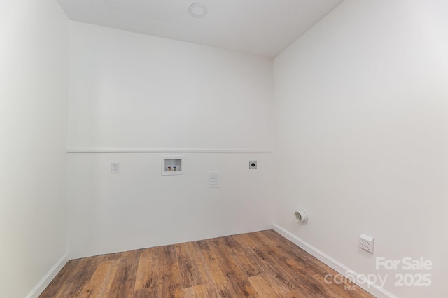 laundry area featuring wood finished floors, laundry area, electric dryer hookup, washer hookup, and baseboards