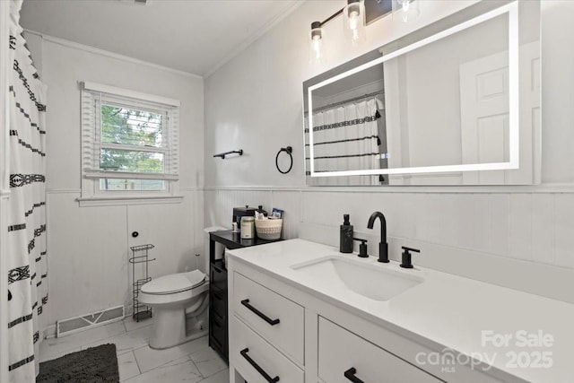 135 Mcshag Dr, Kannapolis, NC 28081 - full bathroom featuring visible vents, vanity, toilet, marble finish floor, and ornamental molding