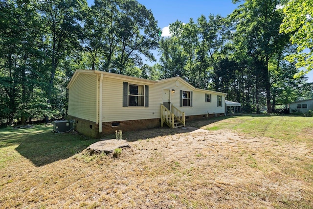 3317 Treyburn Dr, Midland, NC 28107 - manufactured / mobile home featuring a front lawn, central AC, and crawl space