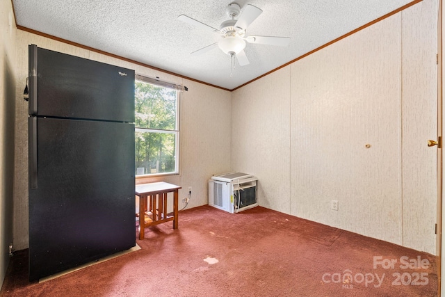 3317 Treyburn Dr, Midland, NC 28107 - spare room with crown molding, carpet floors, ceiling fan, and a textured ceiling