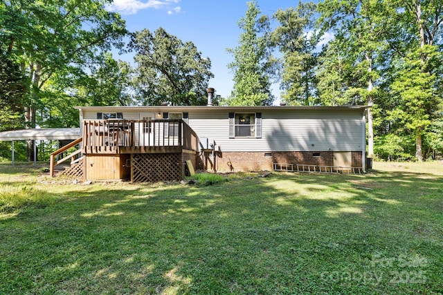 3317 Treyburn Dr, Midland, NC 28107 - back of property with a lawn, crawl space, stairway, and a wooden deck