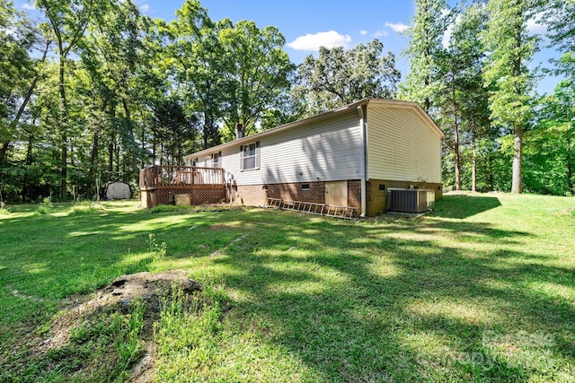 3317 Treyburn Dr, Midland, NC 28107 - exterior space with a lawn, a wooden deck, crawl space, and cooling unit