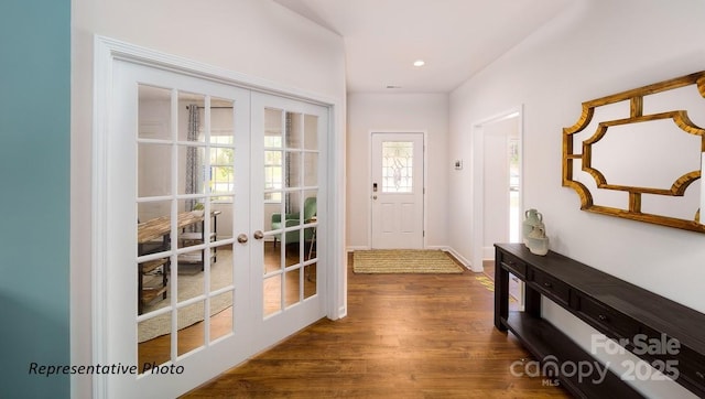 doorway with dark wood-style floors, recessed lighting, french doors, and baseboards
