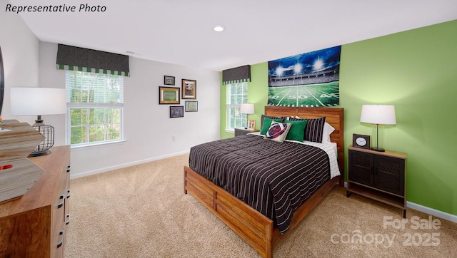 bedroom with baseboards, recessed lighting, and carpet floors