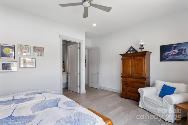 bedroom featuring light wood-style floors, a ceiling fan, and recessed lighting