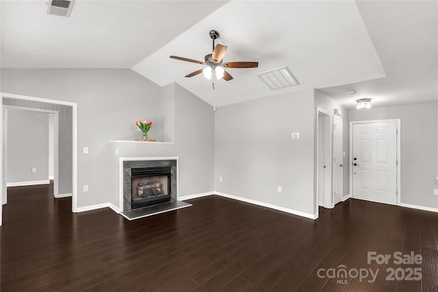 unfurnished living room with lofted ceiling, wood finished floors, visible vents, a fireplace, and ceiling fan
