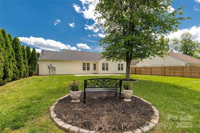 view of yard with fence
