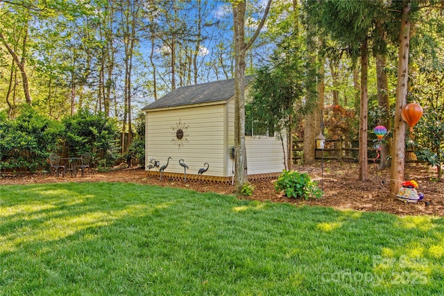 view of shed with fence