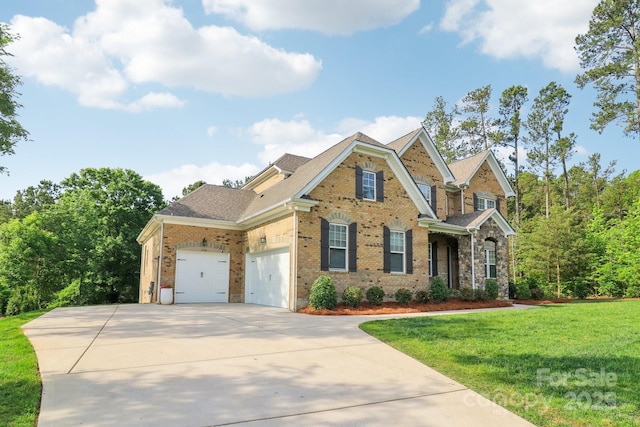 1004 Princesa Dr, Matthews, NC 28104 - craftsman-style house featuring a shingled roof, brick siding, a garage, a front yard, and driveway